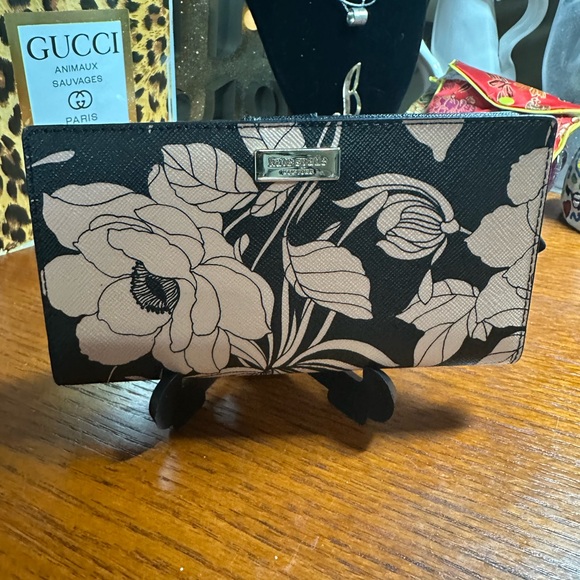 kate spade Handbags - Kate Spade Laurel Way Gardenia Stacy Wallet